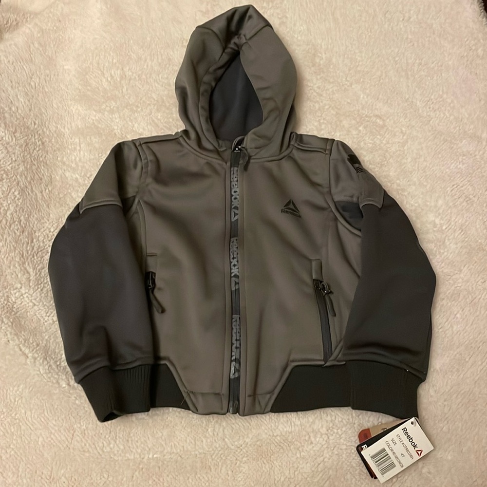 REEBOK:NWT; Boys Size 4T Grey color block hoodie. Wind proof/waterproof,stretch